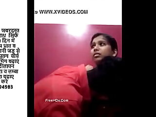 Girl kissed by her boyfriend in bedroom